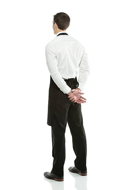 istock Rear view of a man standing in apron 181877481