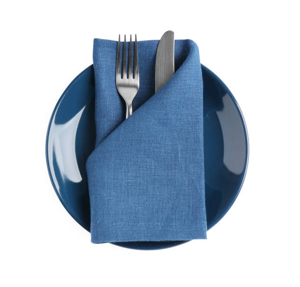 istock Blue plate, fork and knife on white background, top view 1818775580