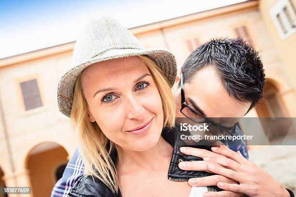 Couple Smiling Outdoors Embraced Stock Photo - Download Image Now - 20-29 Years, 30-39 Years, Adult