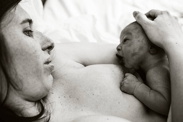 istock First contact between mother and baby 181878360