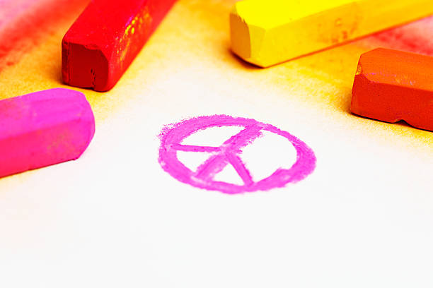 CND peace symbol in pink pastel on sketchpad