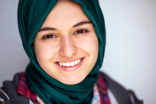 Portrait of a smiling young muslim girl