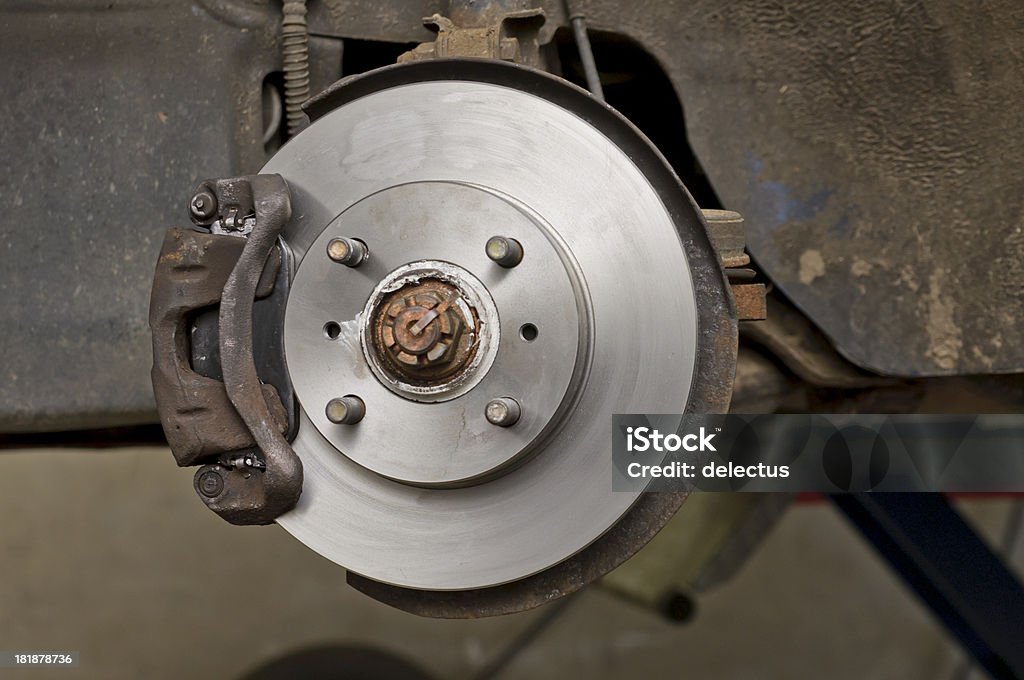 New brake discs on an old car New Brake disks and pads on an old car. Auto Repair Shop Stock Photo