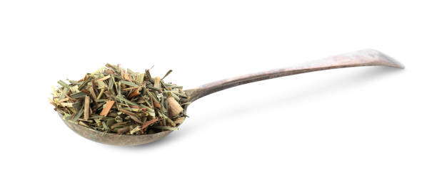 istock Spoon of aromatic dried lemongrass isolated on white 1818793015