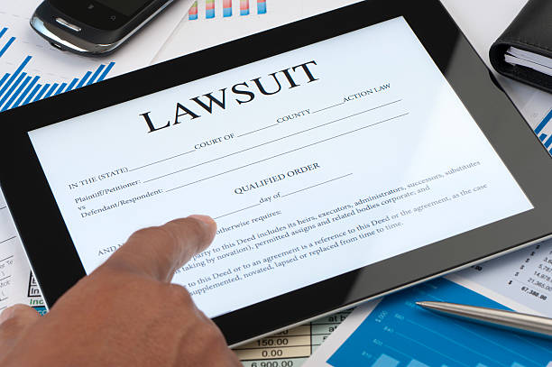 istock Online lawsuit form on a digital tablet 181879894
