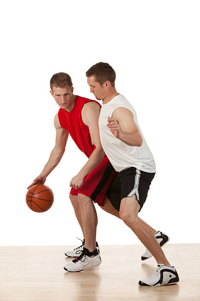 istock Basketball players in action 181880255