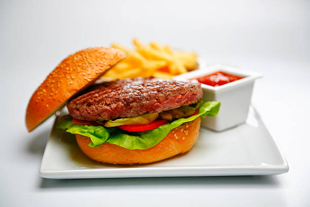 istock open burger and french fries 181880325
