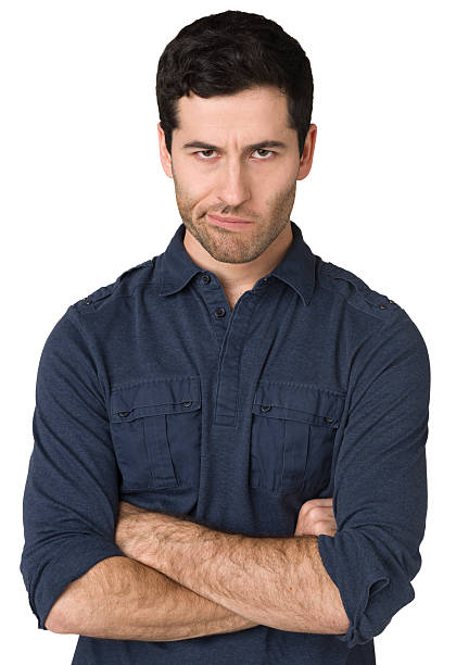 istock Angry Young Man, Staring At Camera, Arms Crossed 181880331