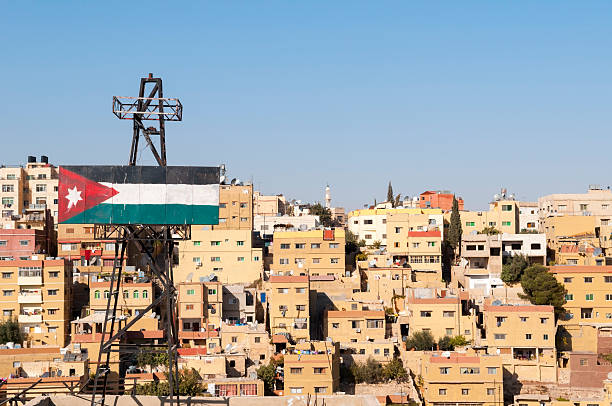 Jordanian flag in Amman, Jordan Jordanian flag in Amman, Jordan amman city stock pictures, royalty-free photos & images