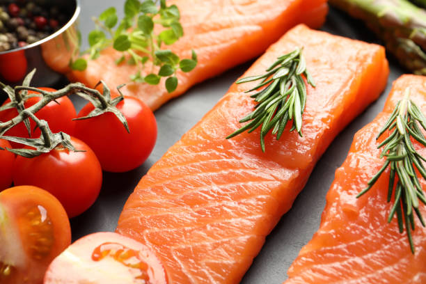 istock Fresh raw salmon and ingredients for marinade on grey table, closeup 1818804951