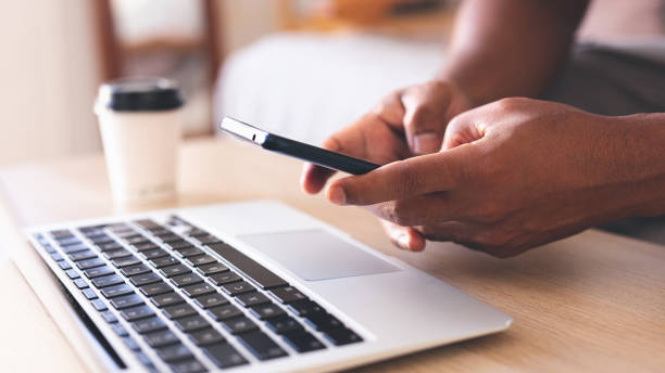 istock young people's hands creating Secure Connection Center, establishing secure nexus for their digital activities. 1818805922