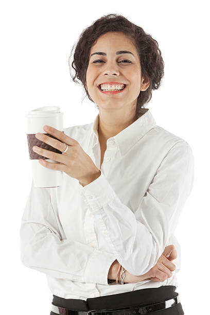 Happy businesswoman holding a disposable cup