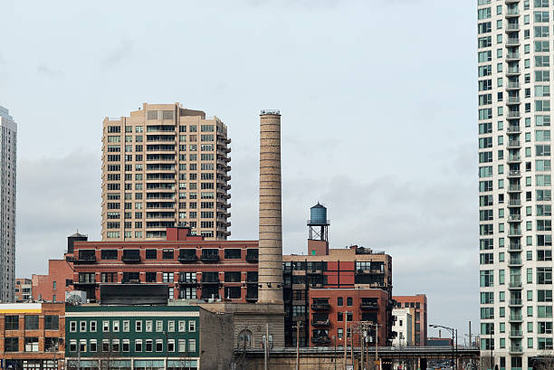 istock Chimney and water tank with buildings 181881160
