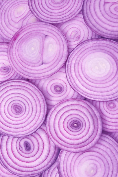 istock Onion slices as a background. Top view. 1818812785