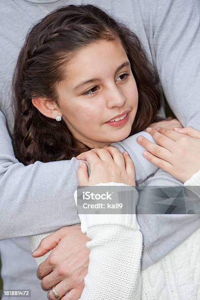 Girl Hugged By Dad Stock Photo - Download Image Now - 10-11 Years, 30-39 Years, Adult