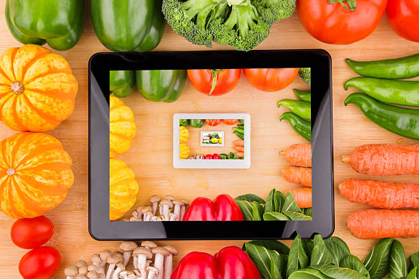 istock E-commerce and online healthy:Vegetables variety with digital tablet 181881506