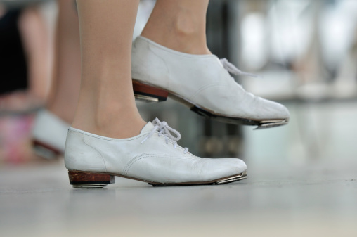 Closeup of dancing clogger's shoes.