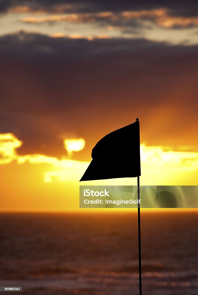 Bandera de Golf y al atardecer - Foto de stock de Ancho libre de derechos