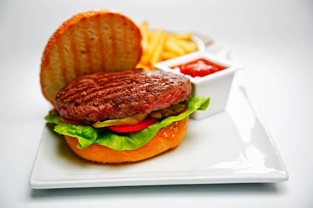 istock open burger and french fries 181882384