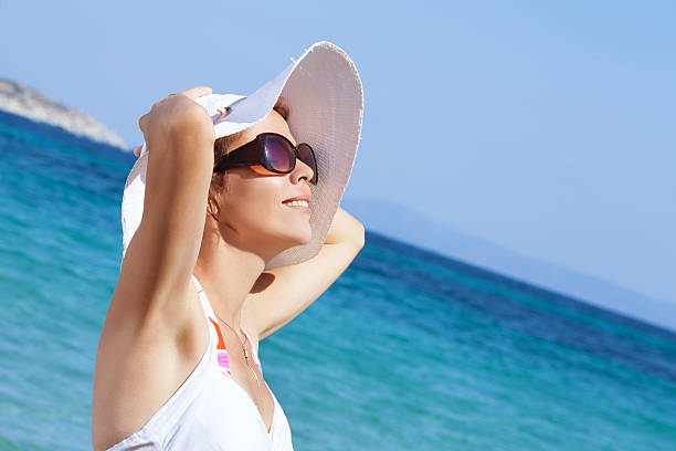istock Woman on the beach 181882956