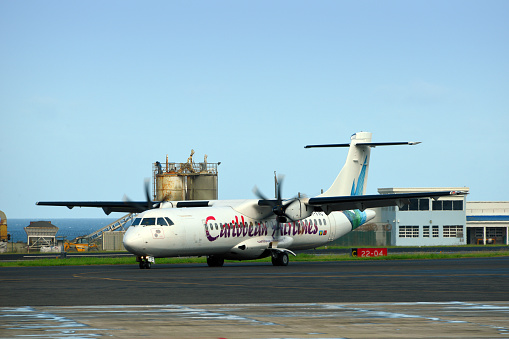 Argyle, Saint Vincent island, Saint Vincent and the Grenadines: Caribbean Airlines ATR-72-600 (72-212A) turboprop regional airliner on the apron (registration 9Y-TTC, MSN 989) - Caribbean Airlines is the national airline of Trinidad and Tobago, headquartered in Port of Spain and based at Piarco Airport  - Argyle International Airport (AIA, IATA SVD) - located 8 km east of the capital, Kingstown, it is St. Vincent and the Grenadines’ principal airport in 2017 - Hub for Air Adelphi, One Caribbean, Mustique Airways, SVG Air