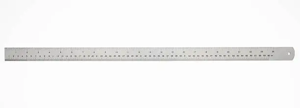 Photo of Isolated shot of 60 cm metal ruler on white background