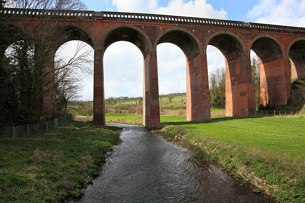 istock viaduct in typical english scene with river bridge 181884384
