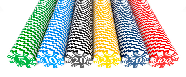 Casino chip stacks over white background
