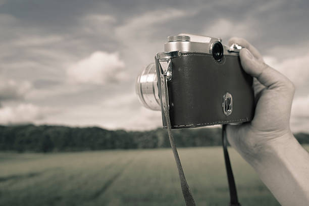 istock Photographing landscape with an old photo camera 181884707