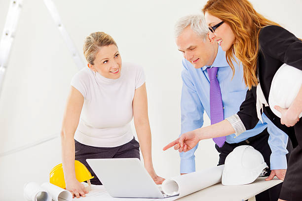 istock Business Team With Blueprint. 181884882