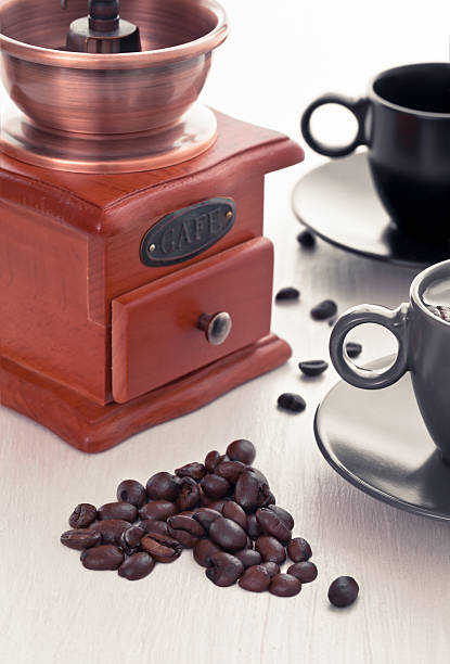 Coffee cup with  grinder stock photo