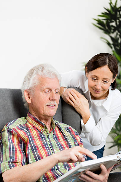 istock Senior man and caregiver 181885706