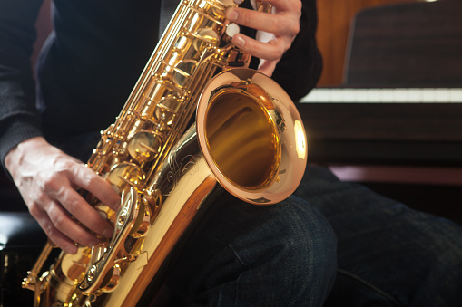 Musician with tenor saxophone