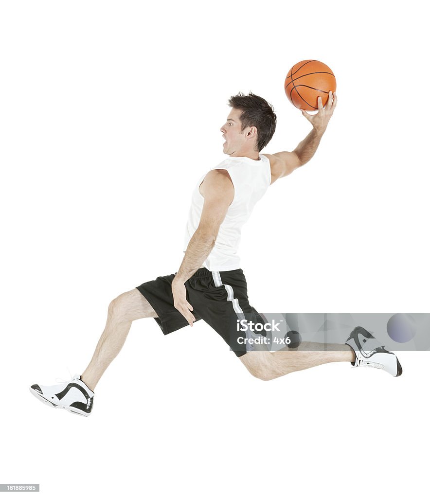 Баскетболист в действии - Стоковые фото Баскетболист роялти-фри
