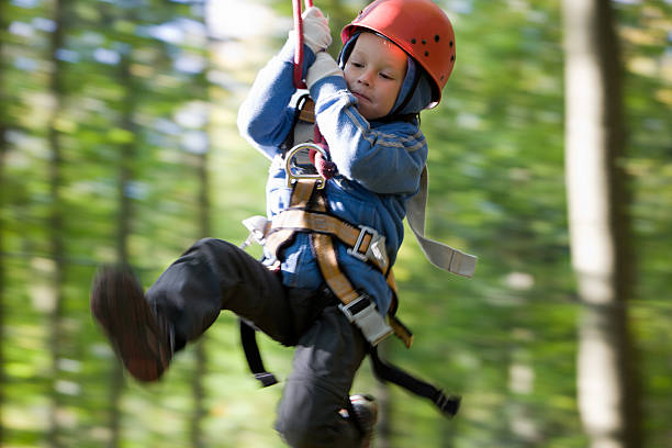 Boy on a Zip-line stock photo