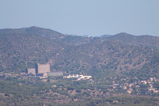 Buildings between hills in Spain