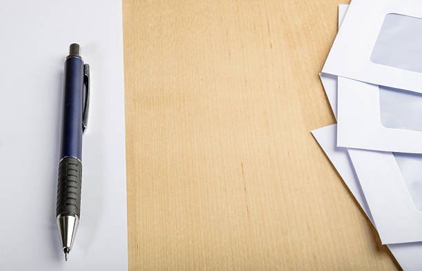istock Writing a letter on wooden table 181886541