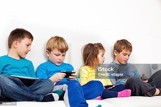 Children And Technology Stock Photo - Download Image Now - Boys, Brother, Cheerful