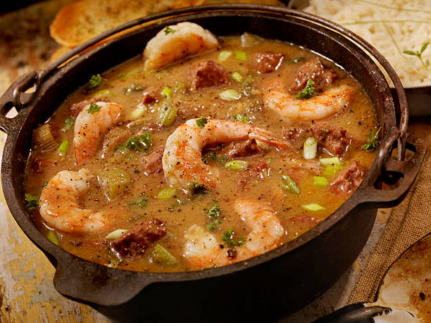 Shrimp and Sausage Gumbo Creole Style Shrimp and Sausage Gumbo with white rice and French bread- Photographed on Hasselblad H3D2-39mb Camera shrimp seafood photos stock pictures, royalty-free photos & images