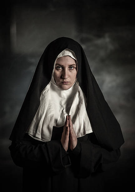 istock Praying at the church 181887075