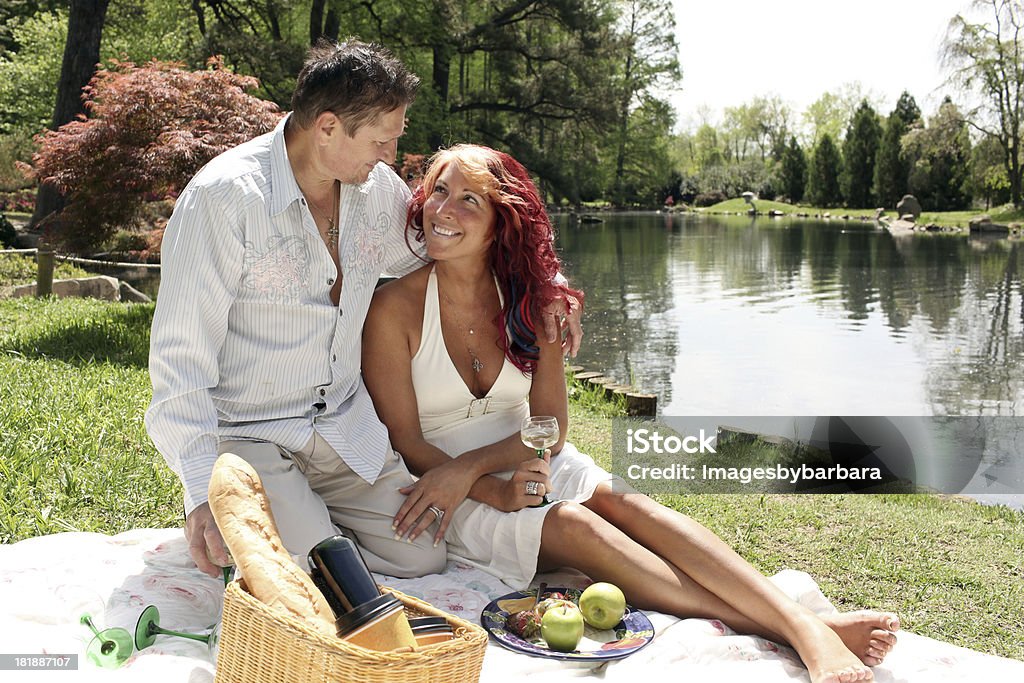 Picnic Married couple having a picnic on a sunny spring day. 30-34 Years Stock Photo