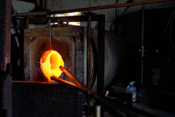 istock Glass being melted in furnace at workshop 1818871459