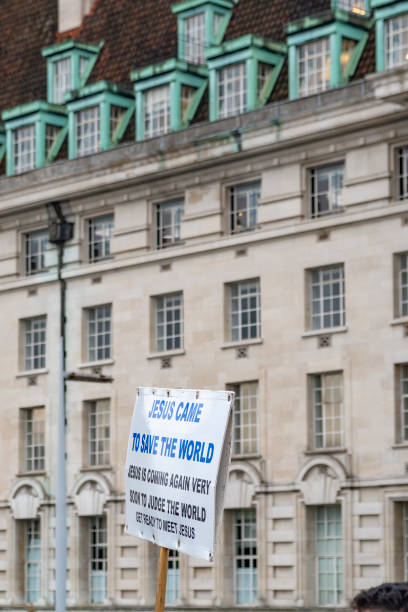 istock Sign held aloft on Westminster Bridge in front of County Hall. 1818873106