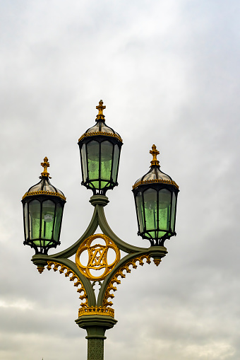 Street light on Westminster Bridge in front of County Hall..  Westminster Bridge, London, UK.