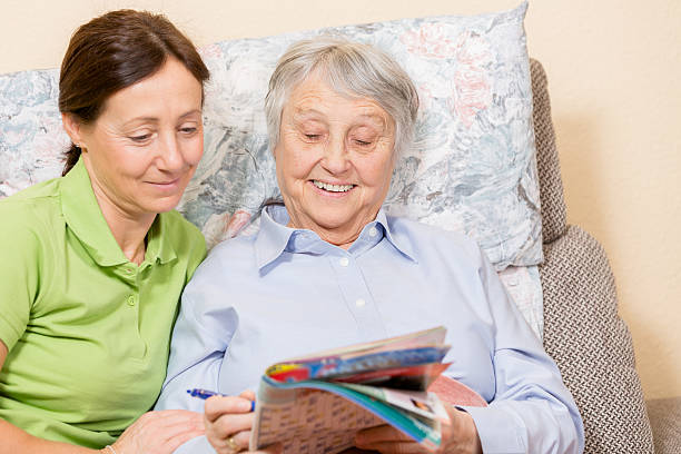 istock Senior woman and caregiver 181887764
