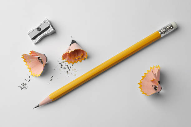 istock Graphite pencil, shavings and sharpener on white background, flat lay 1818880692