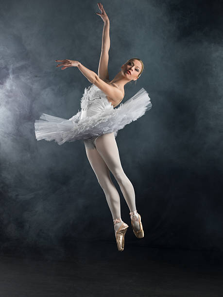 istock Female ballet dancer jumping in air 181888094