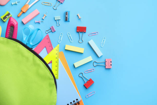 istock Back to school. Many different school stationery on light blue background, flat lay. Space for text 1818881252