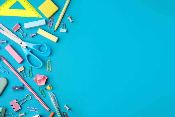 istock Different school stationery items on light blue background, flat lay with space for text. Back to school 1818881805