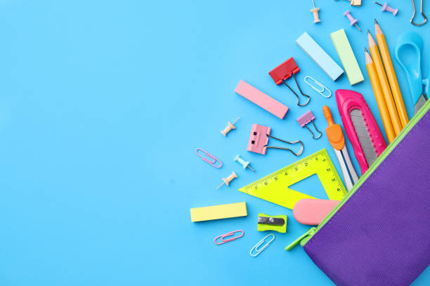 istock Back to school. Many different school stationery on light blue background, flat lay. Space for text 1818882313
